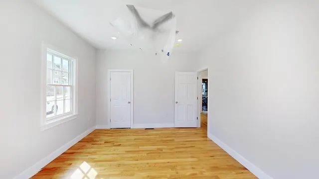 a view of an empty room and window