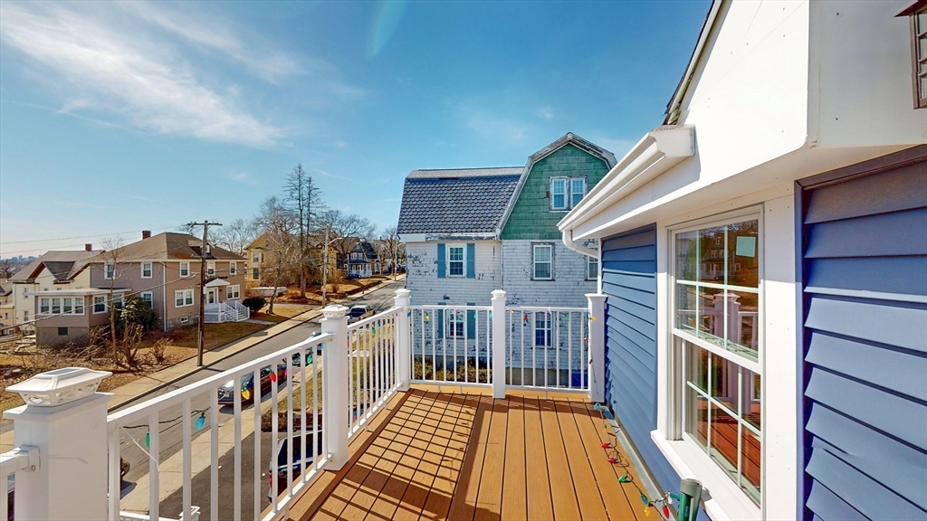 48 Rockwell Street, Unit 1 Malden, MA 02148 - Photo 32 of 34 a view of a balcony with city view