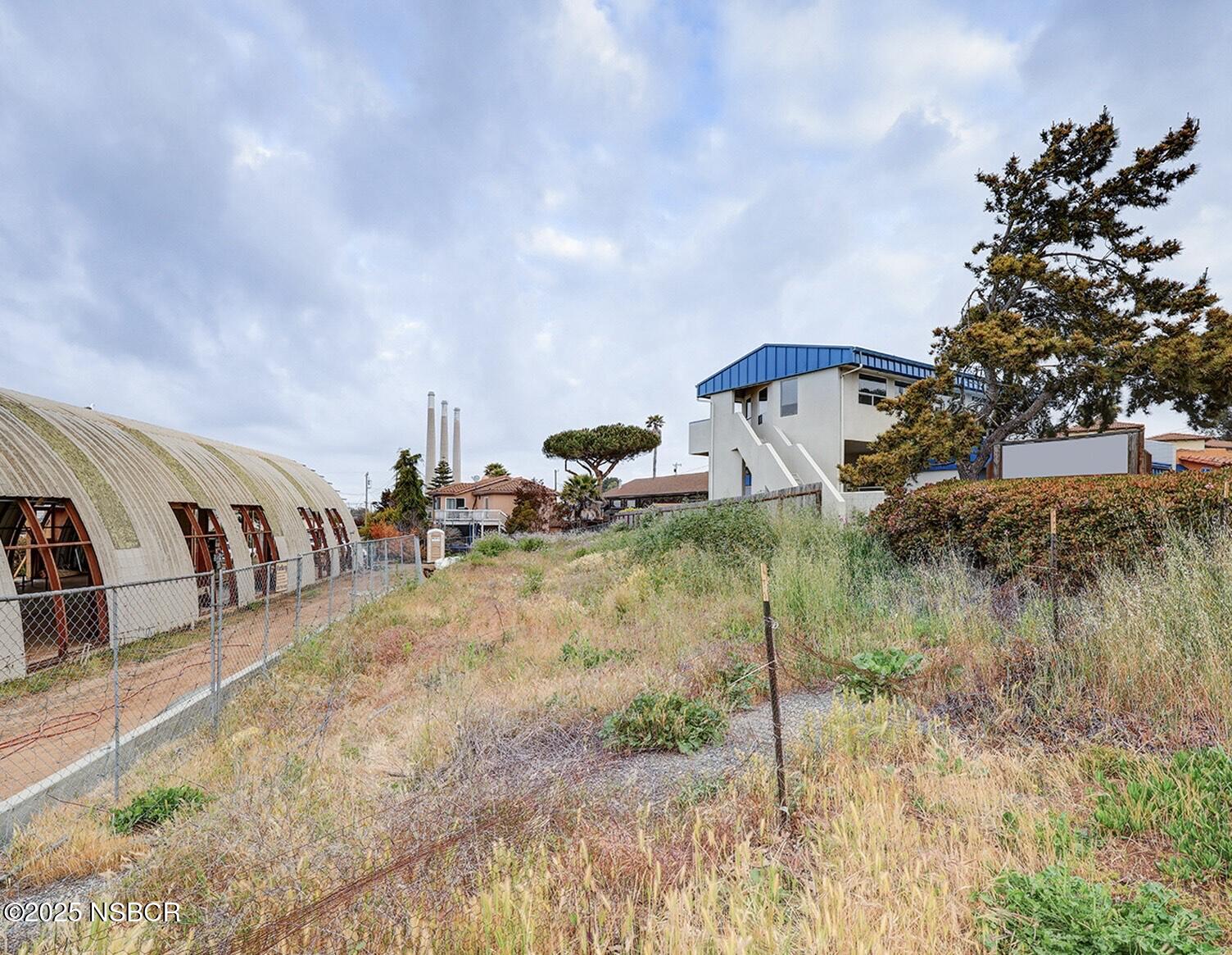 1151 Main Street Morro Bay, CA 93442 - Photo 2 of 3 a view of swimming pool with a yard