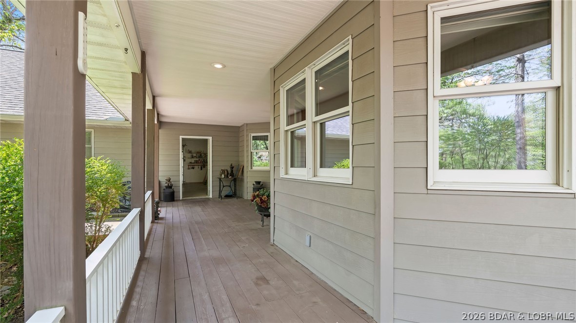 87 Perkins Road Sunrise Beach, MO 65079 - Photo 73 of 87 Wrap around deck covered