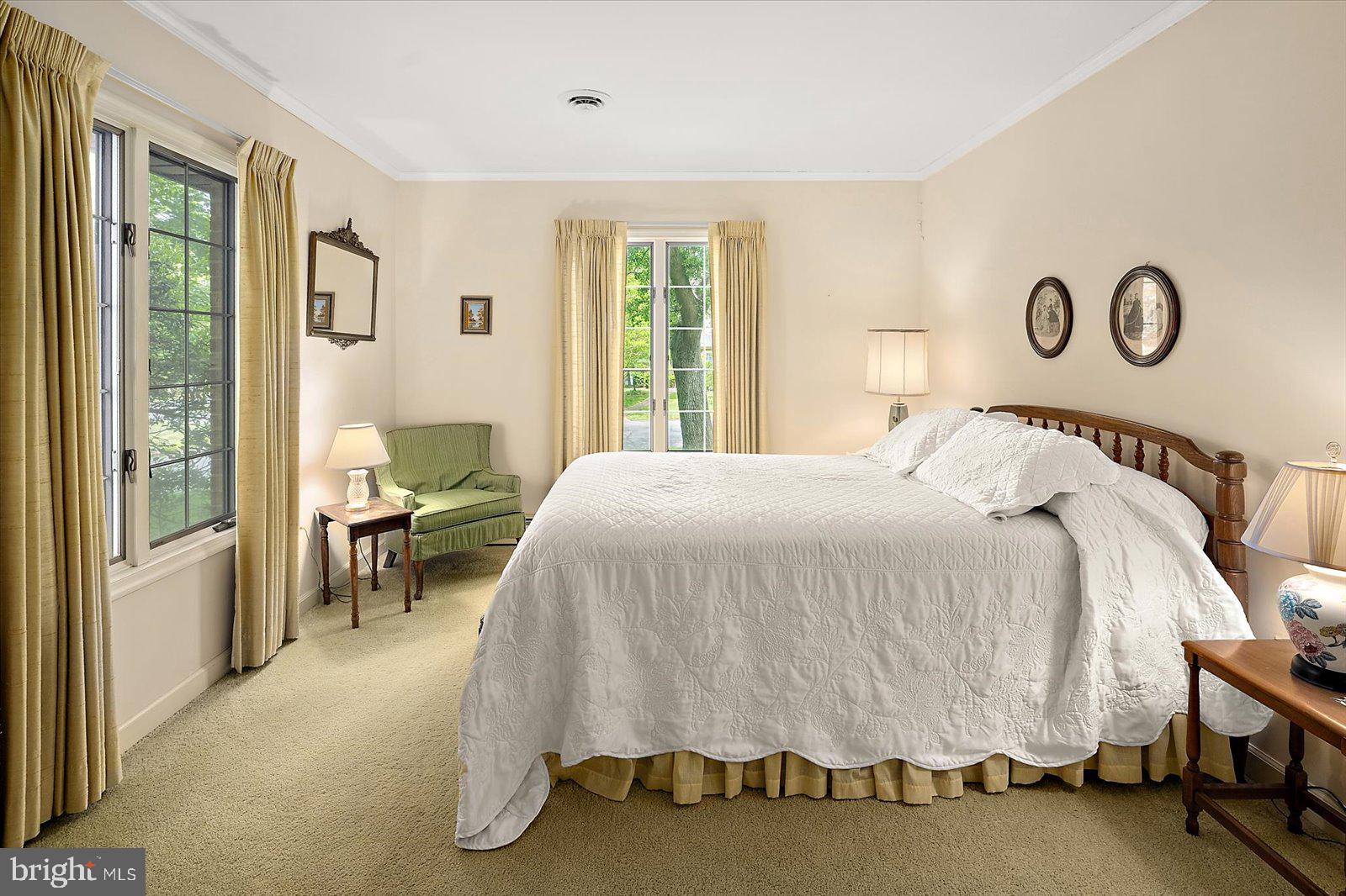 701 Riverside Pines Court Salisbury, MD 21801 - Photo 58 of 81 a bedroom with a bed and a window