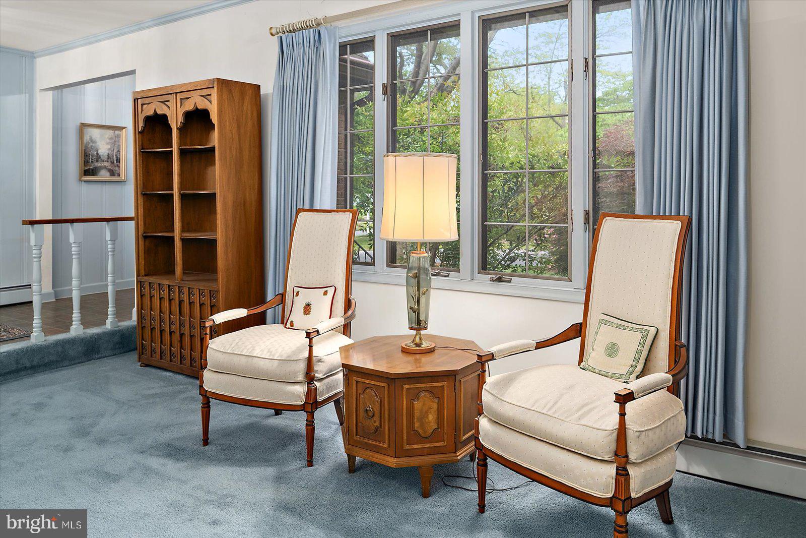 701 Riverside Pines Court Salisbury, MD 21801 - Photo 7 of 81 a living room with furniture a window and a chandelier