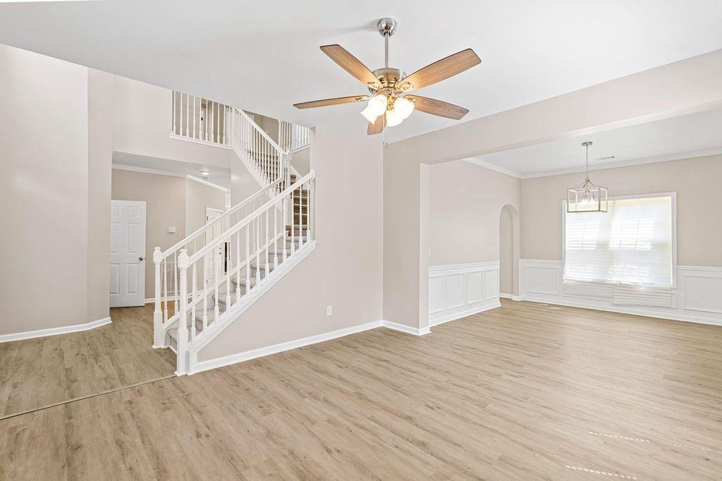 473 Greyhawk Way Fairburn, GA 30213 - Photo 4 of 34 a view of an entryway with wooden floor