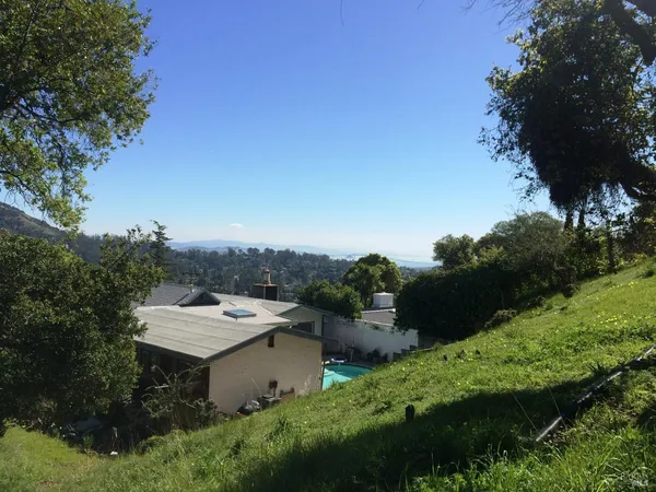 a view of a house in a forest