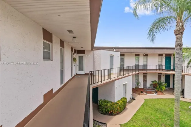 $230,000 | 7 Greenway Village North, Unit 205, Royal Palm Beach, FL 33411