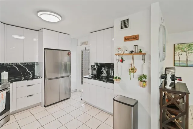 $230,000 | 7 Greenway Village North, Unit 205, Royal Palm Beach, FL 33411