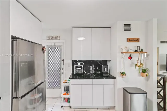 $230,000 | 7 Greenway Village North, Unit 205, Royal Palm Beach, FL 33411