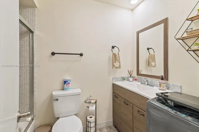 $230,000 | 7 Greenway Village North, Unit 205, Royal Palm Beach, FL 33411