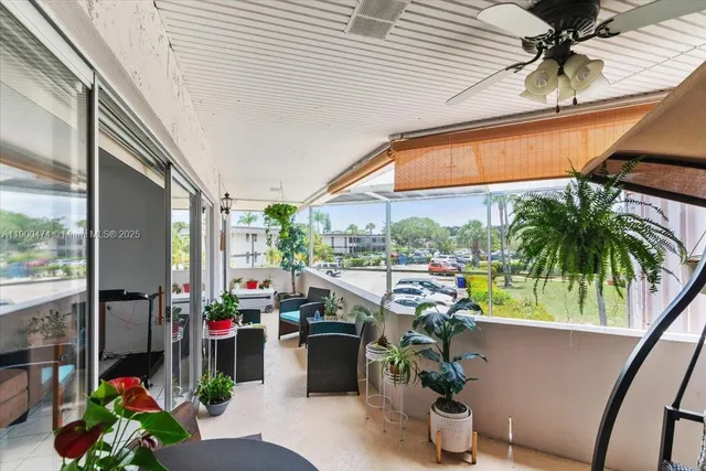 $230,000 | 7 Greenway Village North, Unit 205, Royal Palm Beach, FL 33411