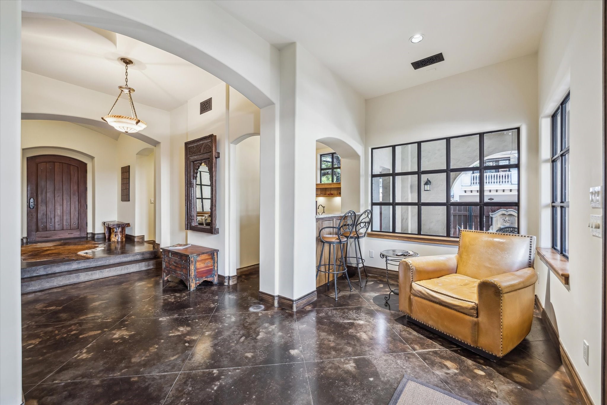 4320 Dickson Street Houston, TX 77007 - Photo 12 of 47 Lounge area off kitchenette on first floor, open to outdoor loggia.