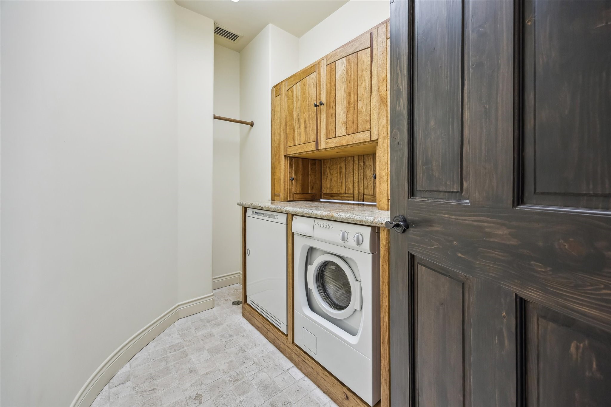 4320 Dickson Street Houston, TX 77007 - Photo 34 of 47 a utility room with dryer and washer