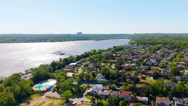 a view of lake with green space