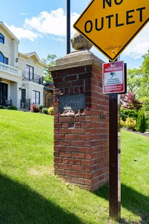 a brick building with a yard