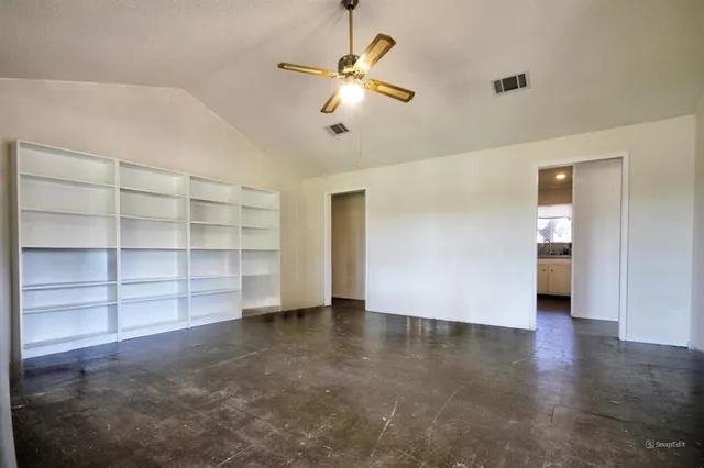 a view of a a dining room with furniture window and wooden floor
