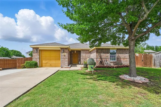 a backyard of a house with seating space