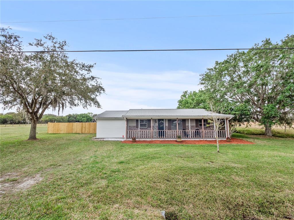 front view of a house with a big yard