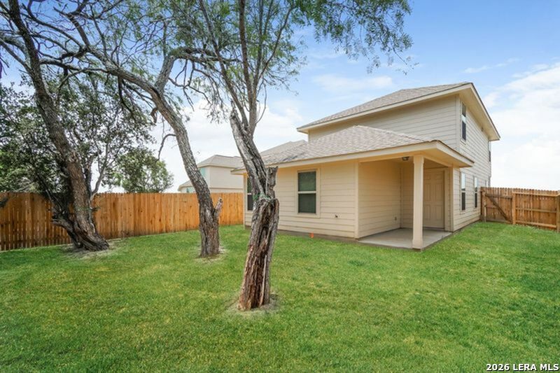 10702 Apple Pie Road San Antonio, TX 78224 - Photo 3 of 19 a view of a house with a yard