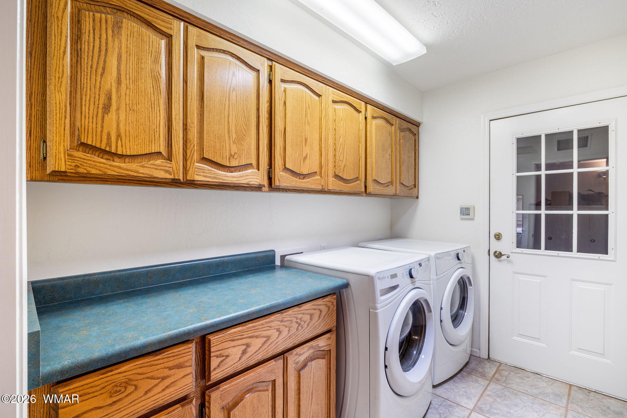2922 Pine Rim Road Overgaard, AZ 85933 - Photo 29 of 58 a utility room with dryer and washer