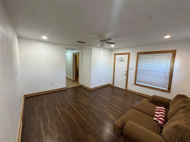 a view of livingroom with furniture and wooden floor