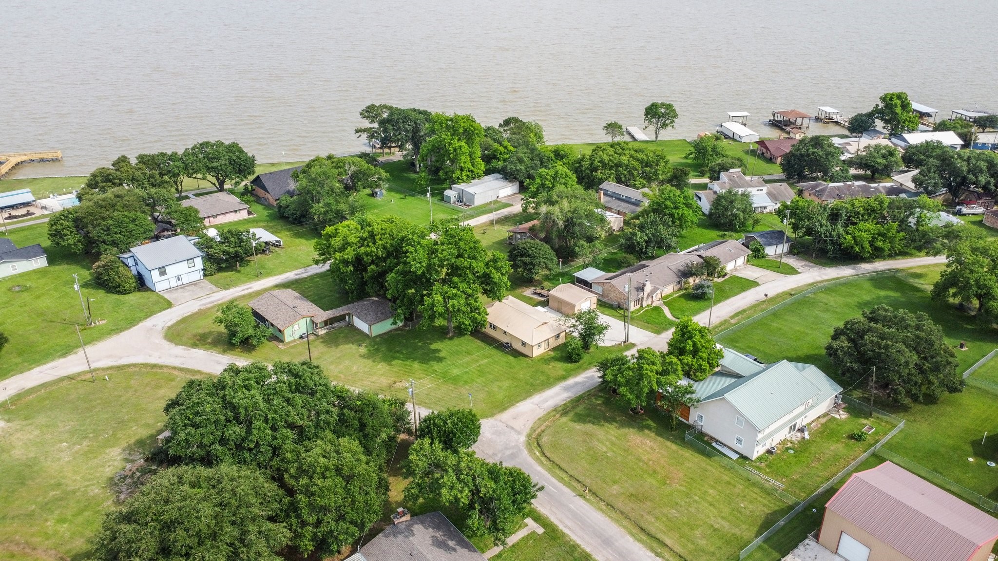 21 Clearview Point Blank, TX 77364 - Photo 31 of 43 an aerial view of a house with a yard
