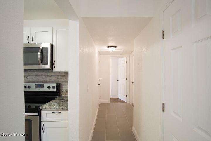1089 Hampton Road Daytona Beach, FL 32114 - Photo 11 of 23 Tile and Hardwood Flooring Throughout