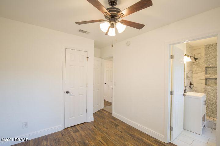 1089 Hampton Road Daytona Beach, FL 32114 - Photo 12 of 23 Master Bedroom with En-Suite Bath