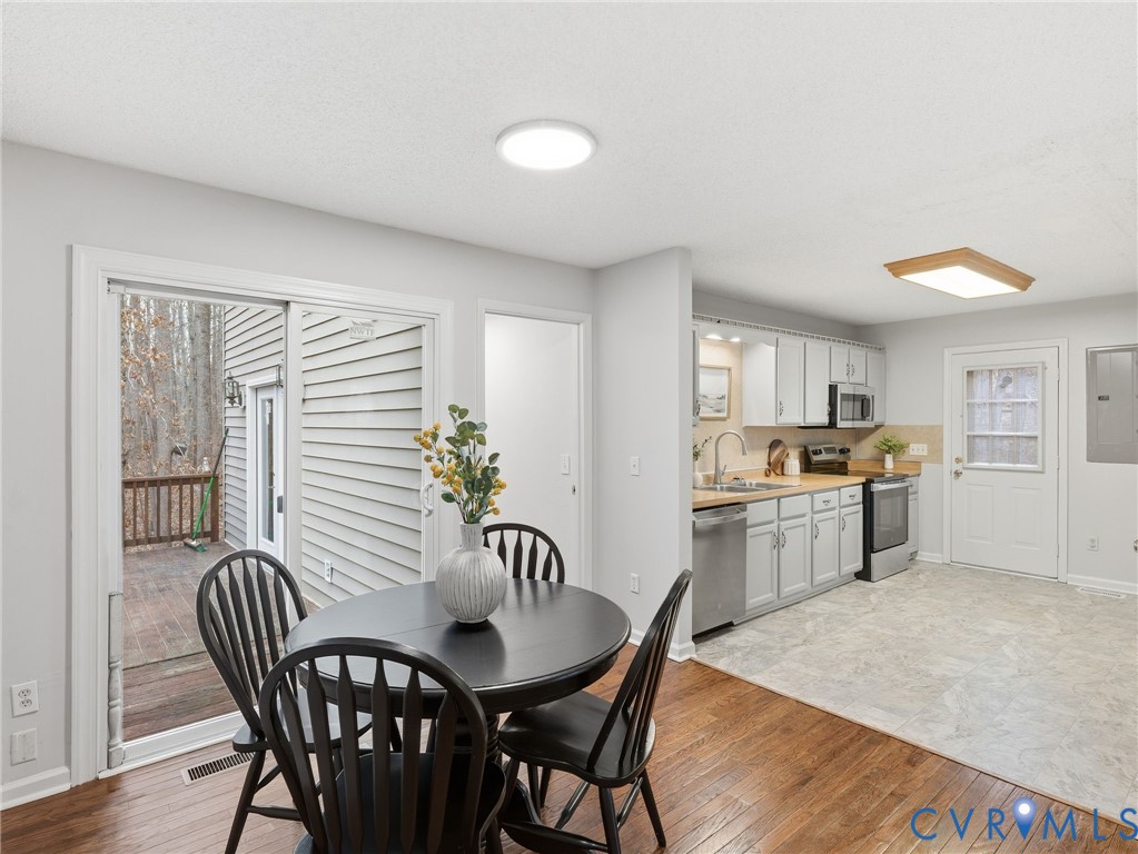1637 Gardners Road Mineral, VA 23117 - Photo 11 of 30 a view of a dining room with furniture and window