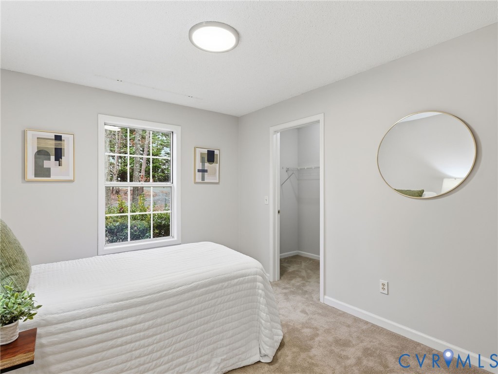 1637 Gardners Road Mineral, VA 23117 - Photo 12 of 30 a bedroom with a bed and a large window