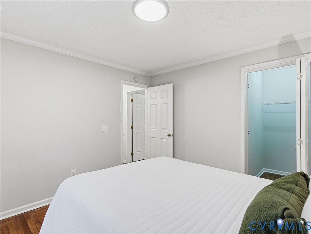 1637 Gardners Road Mineral, VA 23117 - Photo 14 of 30 a bedroom with a bed and a fan