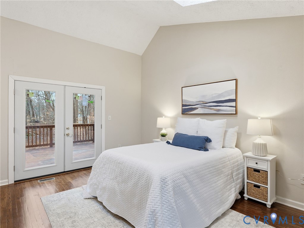 1637 Gardners Road Mineral, VA 23117 - Photo 17 of 30 a bedroom with a large bed and a lamp on dresser