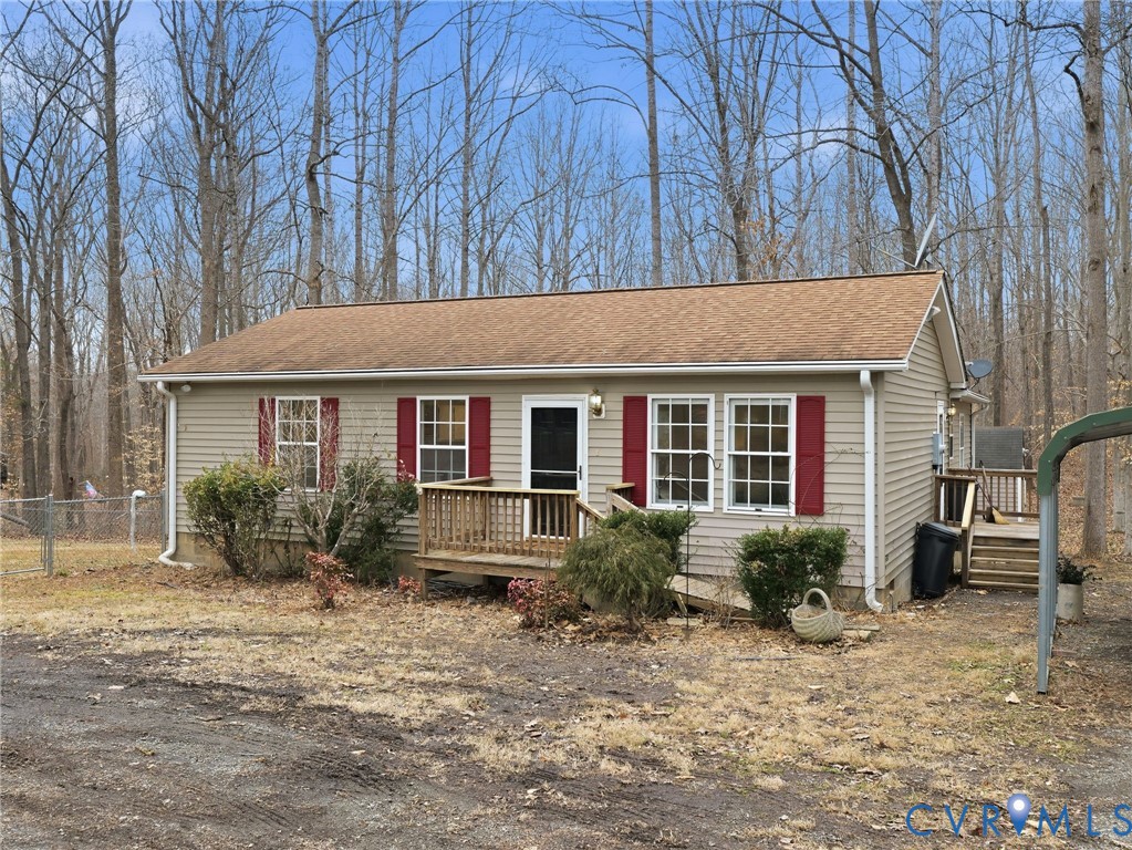 1637 Gardners Road Mineral, VA 23117 - Photo 2 of 30 a front view of a house with garden and porch