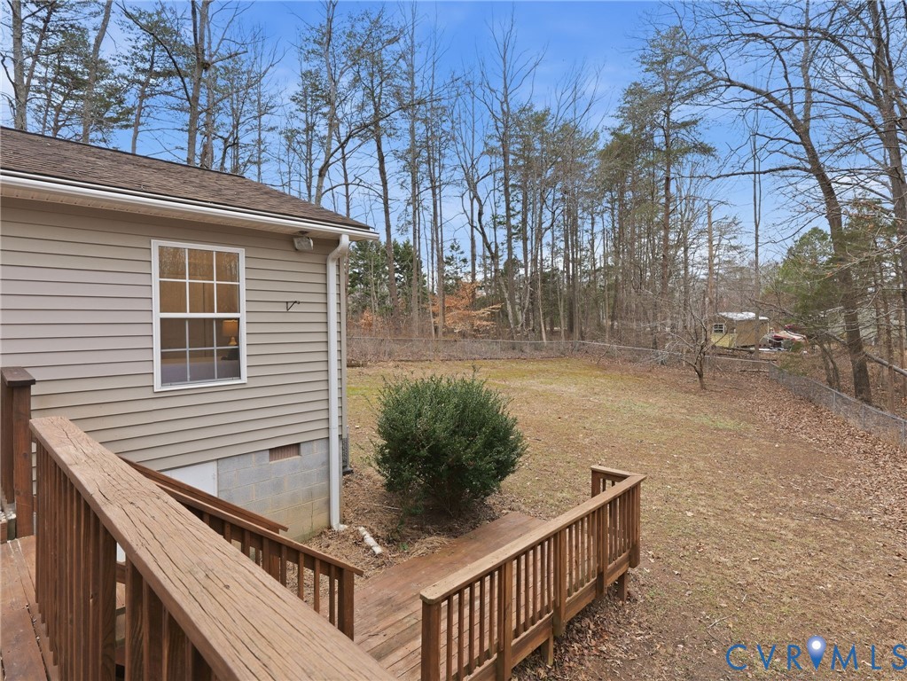 1637 Gardners Road Mineral, VA 23117 - Photo 22 of 30 a view of backyard with deck and outdoor seating