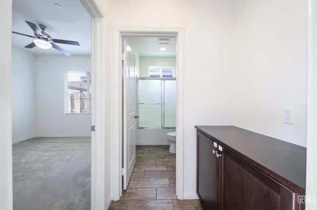 a view of a bathroom from the hallway