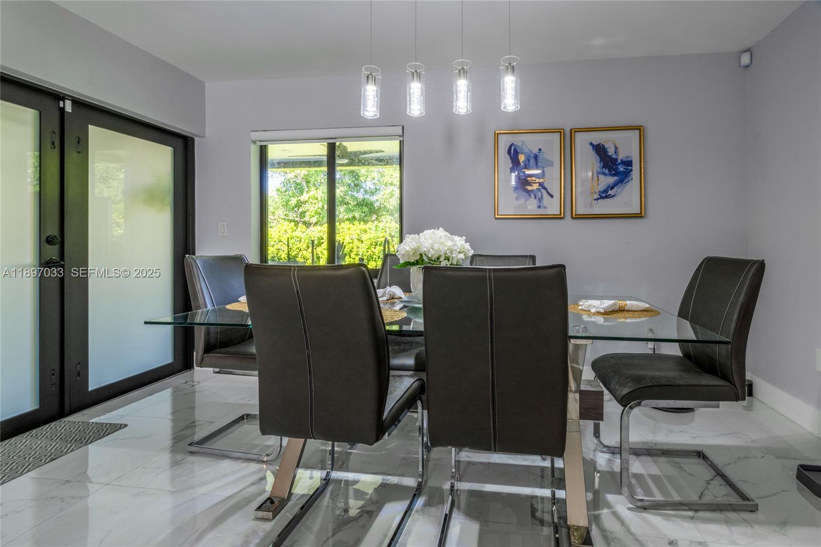 11381 Southwest 247th Terrace Homestead, FL 33032 - Photo 15 of 42 a view of a workspace with furniture and a window