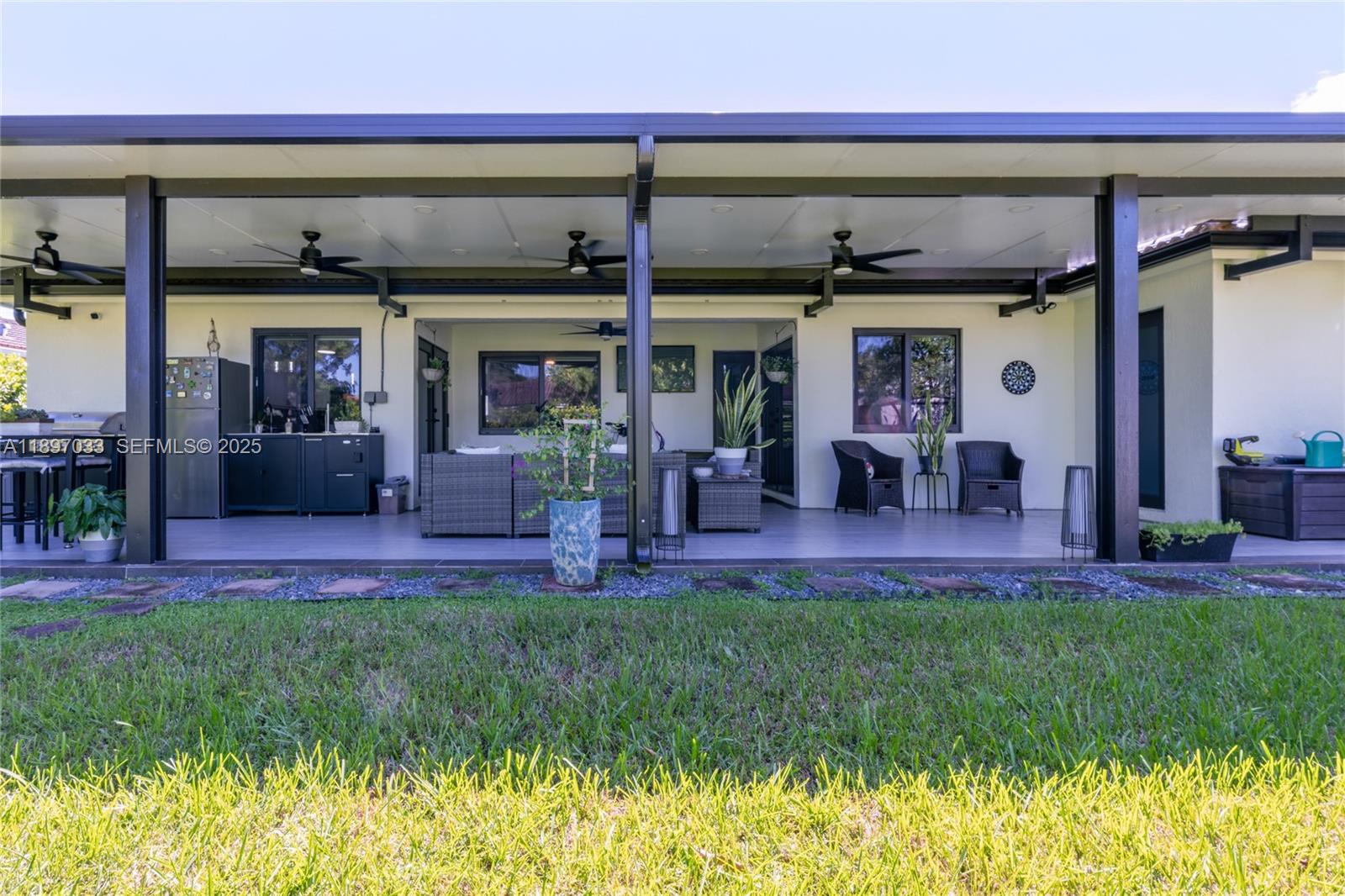 11381 Southwest 247th Terrace Homestead, FL 33032 - Photo 29 of 42 a view of a entryway front of house