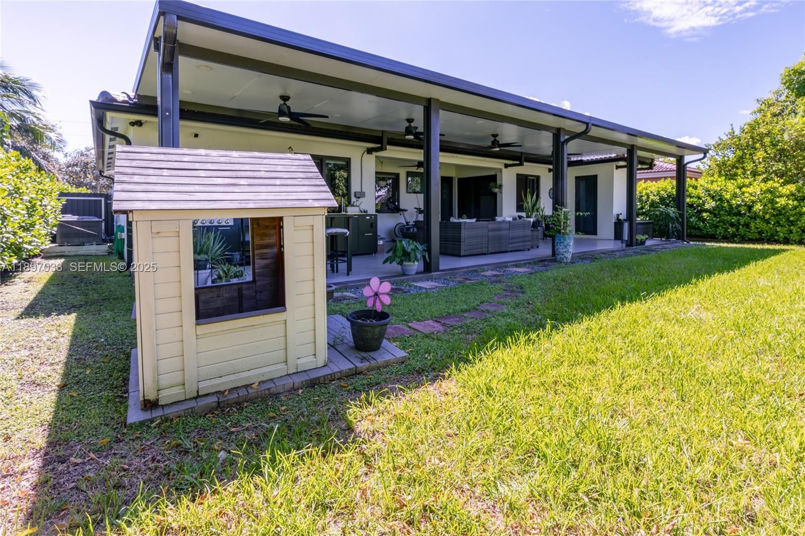 11381 Southwest 247th Terrace Homestead, FL 33032 - Photo 30 of 42 a view of a house with a porch