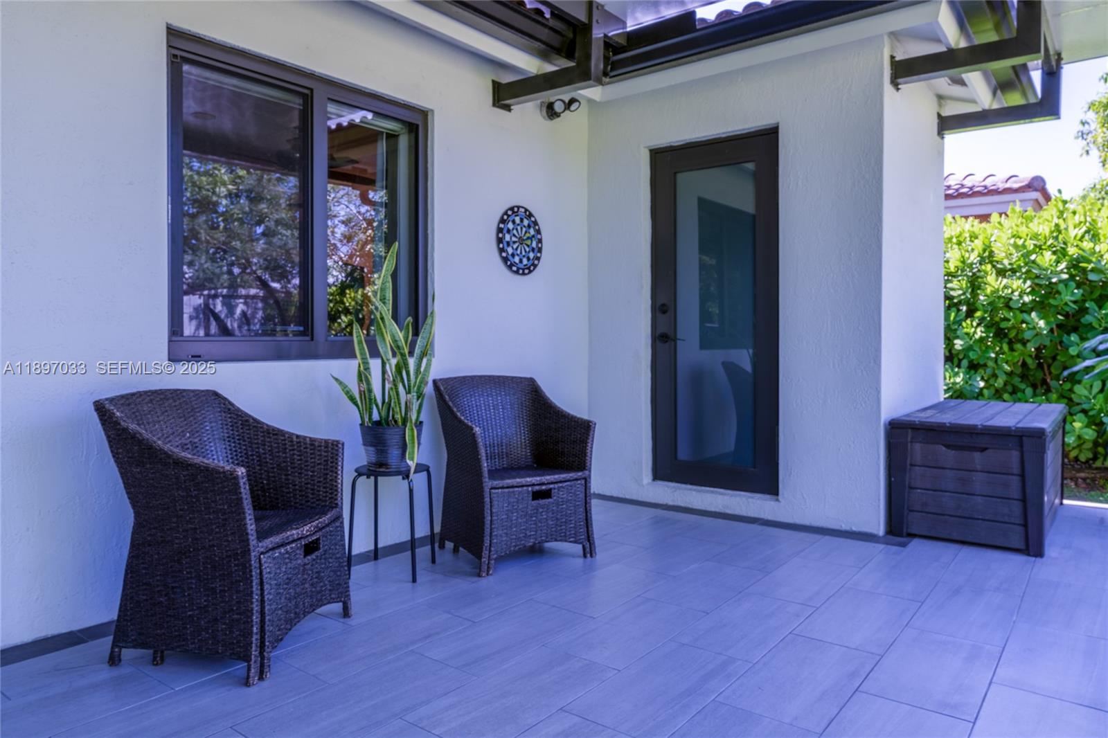 11381 Southwest 247th Terrace Homestead, FL 33032 - Photo 33 of 42 a view of a livingroom with furniture and a potted plant
