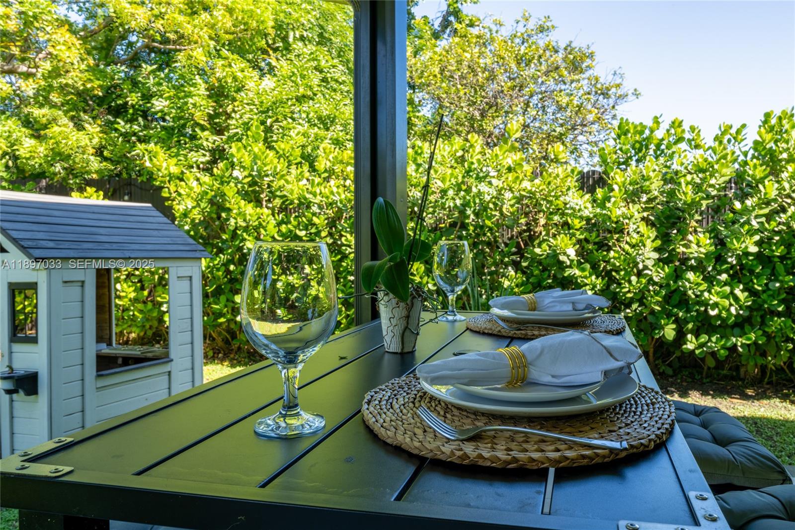 11381 Southwest 247th Terrace Homestead, FL 33032 - Photo 35 of 42 a view of a porch with furniture and a yard