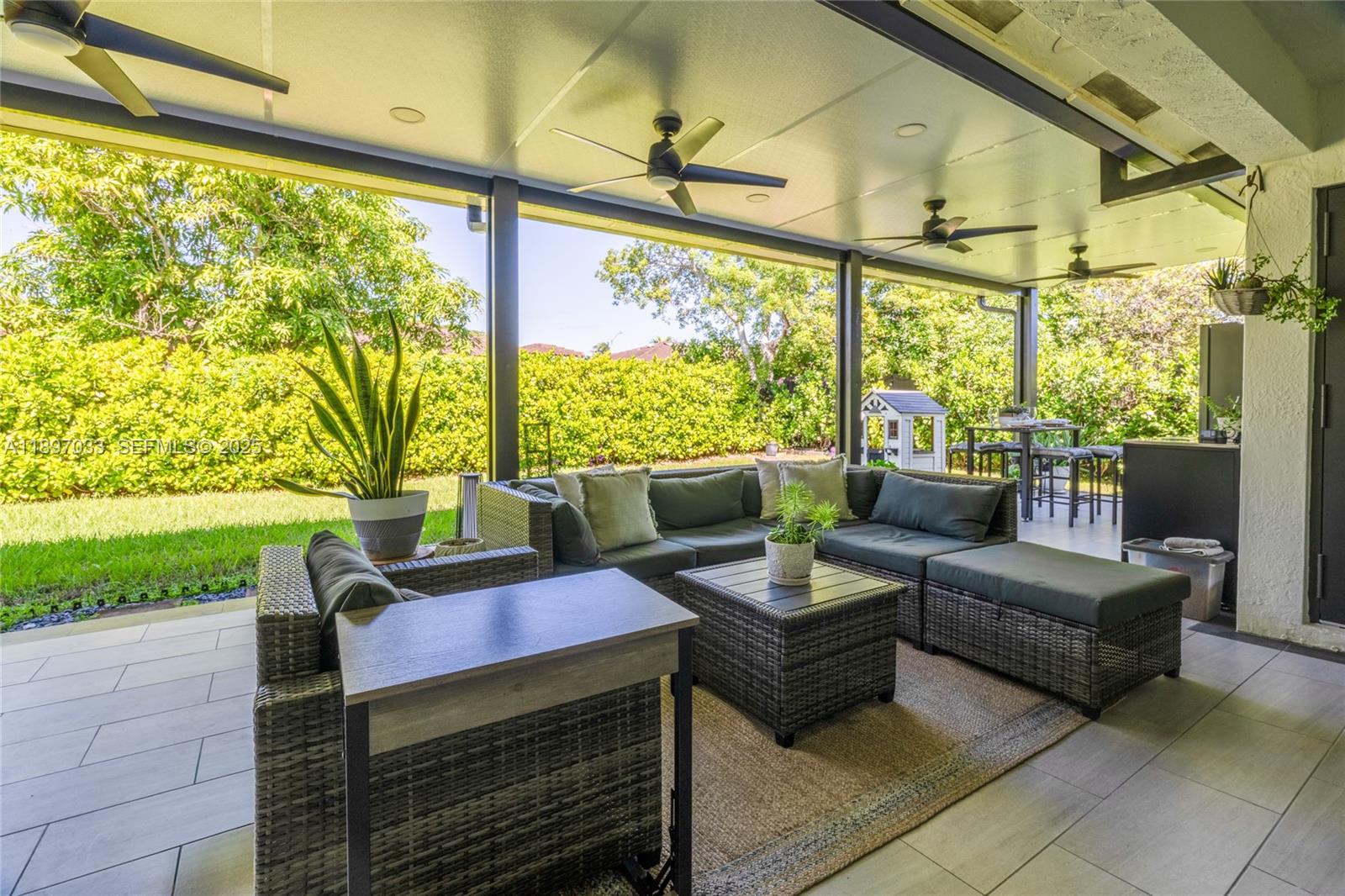 11381 Southwest 247th Terrace Homestead, FL 33032 - Photo 37 of 42 a outdoor living space with furniture