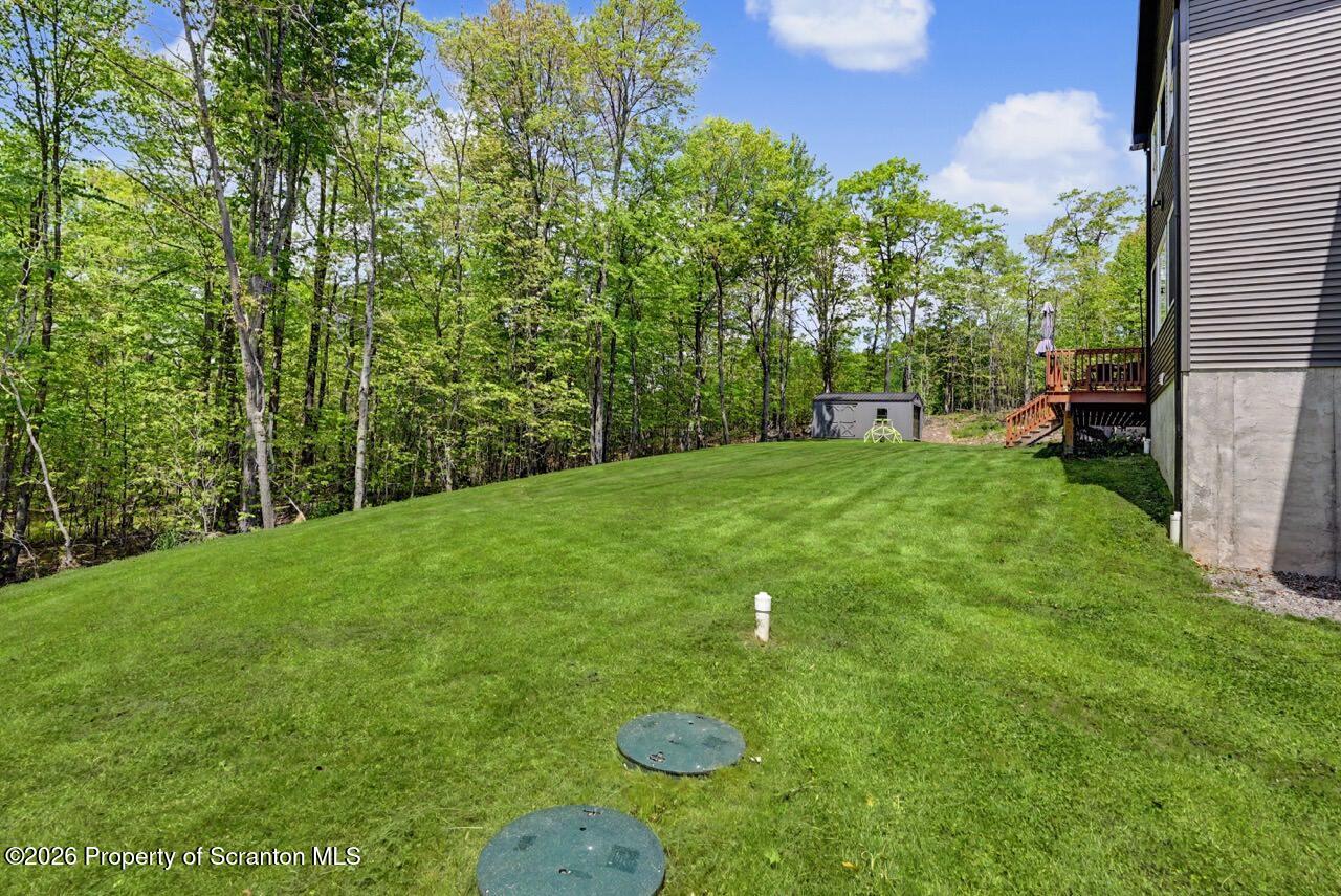 100 Highland Road Moscow, PA 18444 - Photo 82 of 85 a view of a backyard of a house