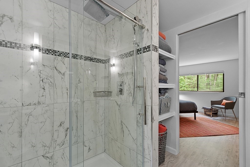 309 Littleton Road Harvard, MA 01451 - Photo 28 of 41 a bathroom with a shower a sink and a shower