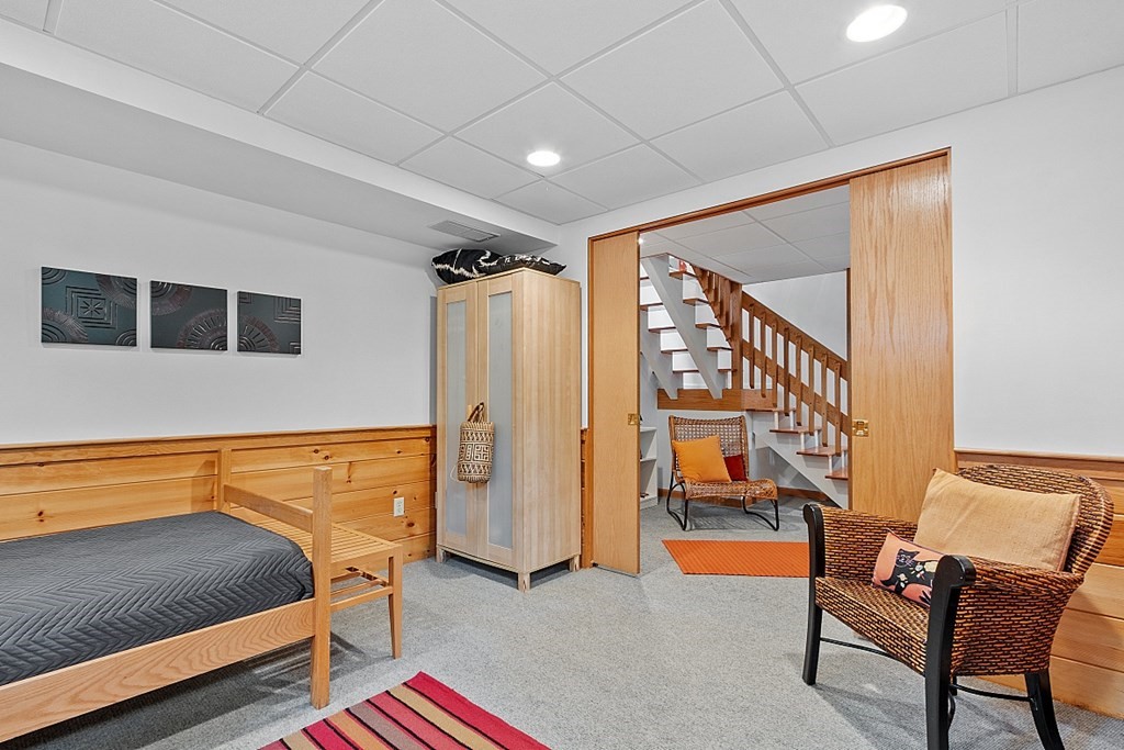 309 Littleton Road Harvard, MA 01451 - Photo 34 of 41 a blue room with furniture and a rug