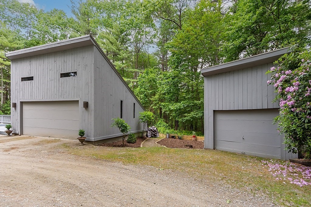 309 Littleton Road Harvard, MA 01451 - Photo 36 of 41 front view of a house with a yard