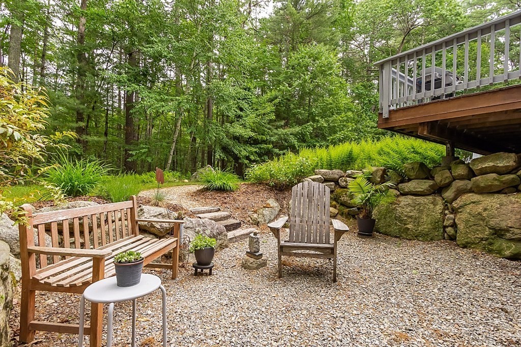 309 Littleton Road Harvard, MA 01451 - Photo 39 of 41 a view of a chairs and table in backyard