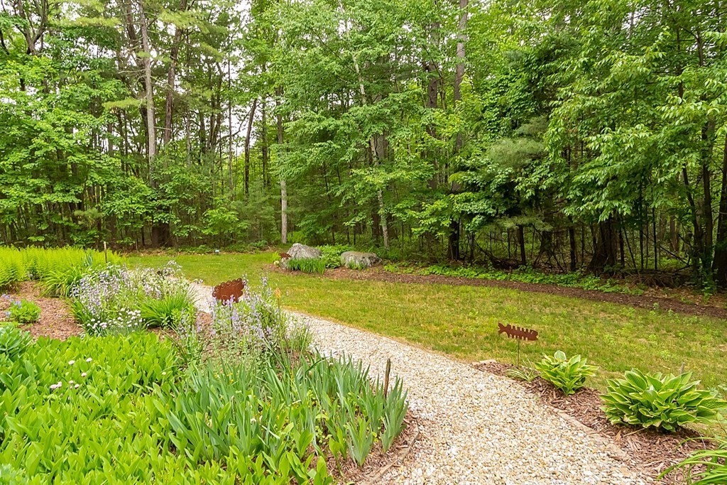 309 Littleton Road Harvard, MA 01451 - Photo 40 of 41 a view of a swimming pool with a garden