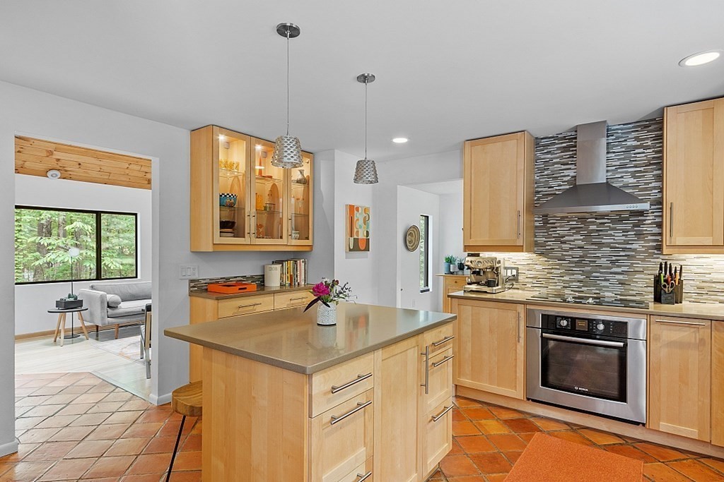 309 Littleton Road Harvard, MA 01451 - Photo 6 of 41 a kitchen with a sink stove and cabinets