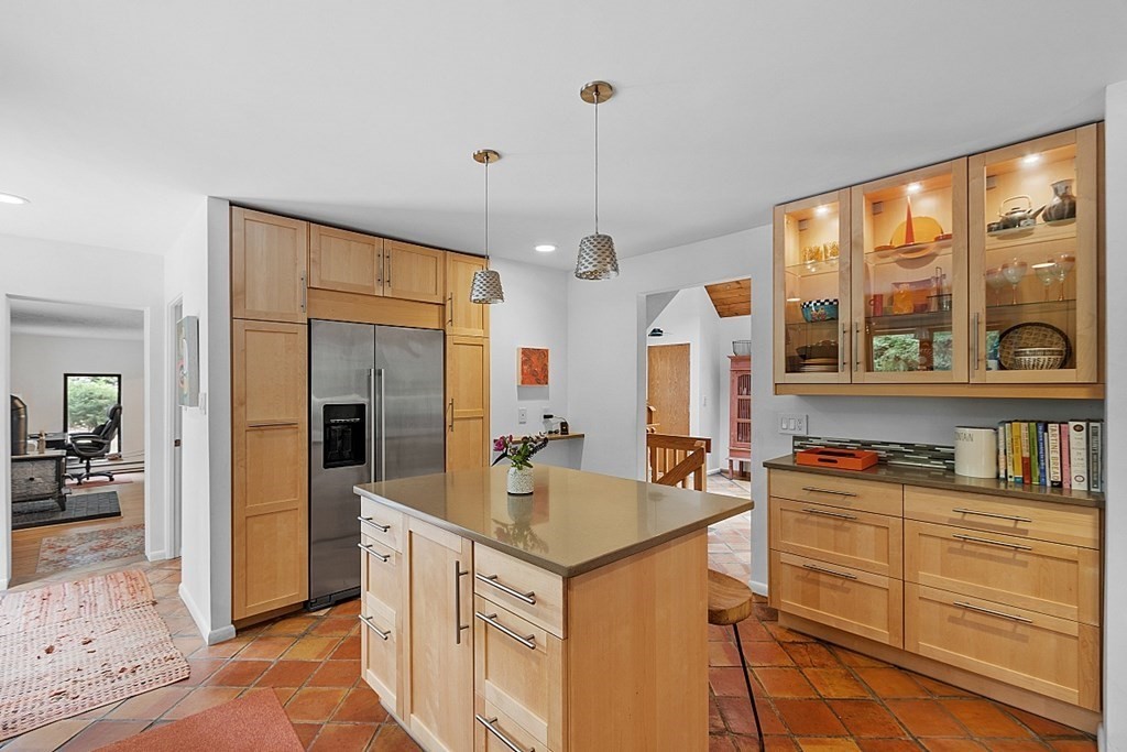 309 Littleton Road Harvard, MA 01451 - Photo 8 of 41 a kitchen with granite countertop a sink stove and refrigerator