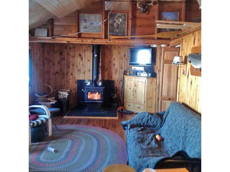 311 West Shore Road Ellsworth, ME 04605 - Photo 9 of 18 Living Room. Living room with large...