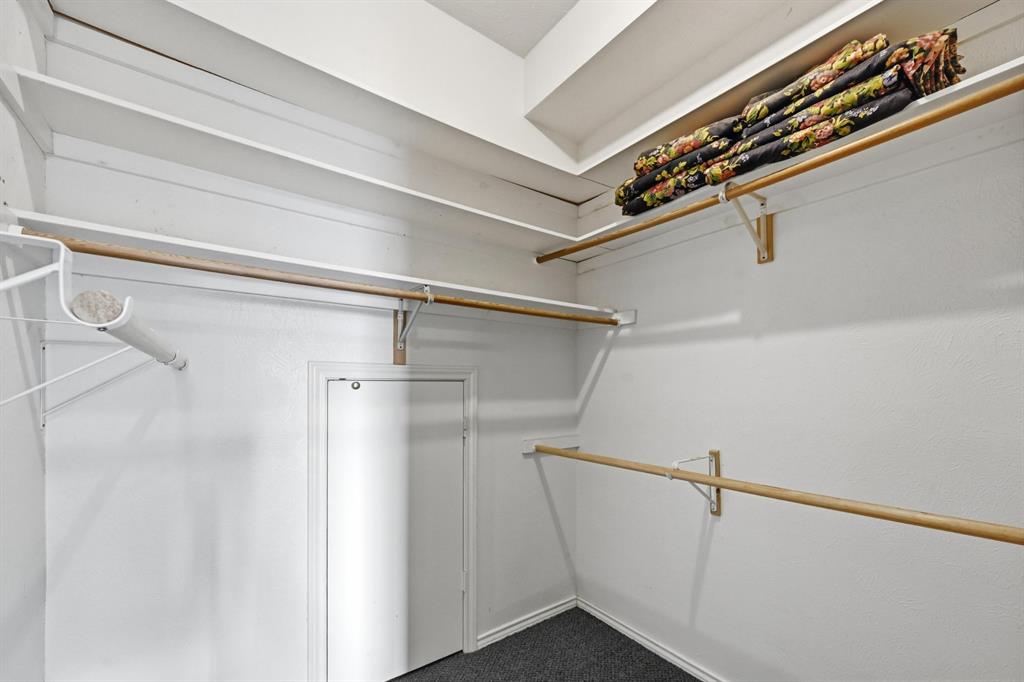 707 Cullins Road Rockwall, TX 75032 - Photo 22 of 40 a view of a room with racks on the wall