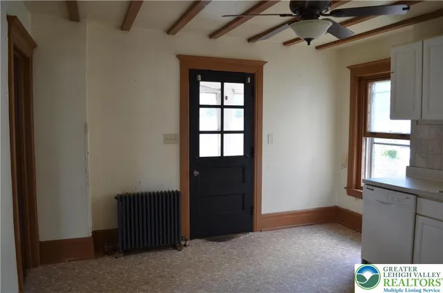 an empty room with windows